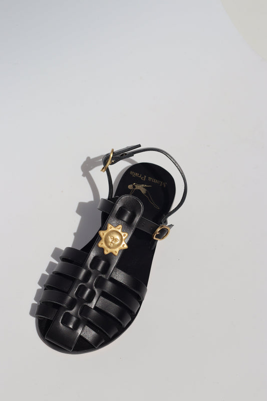 Black leather fisherman sandals with gold sun charm, women's flat caged toe handmade sandals